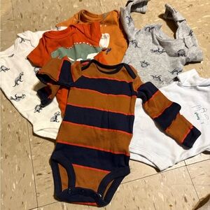 5 Carter onesie’s